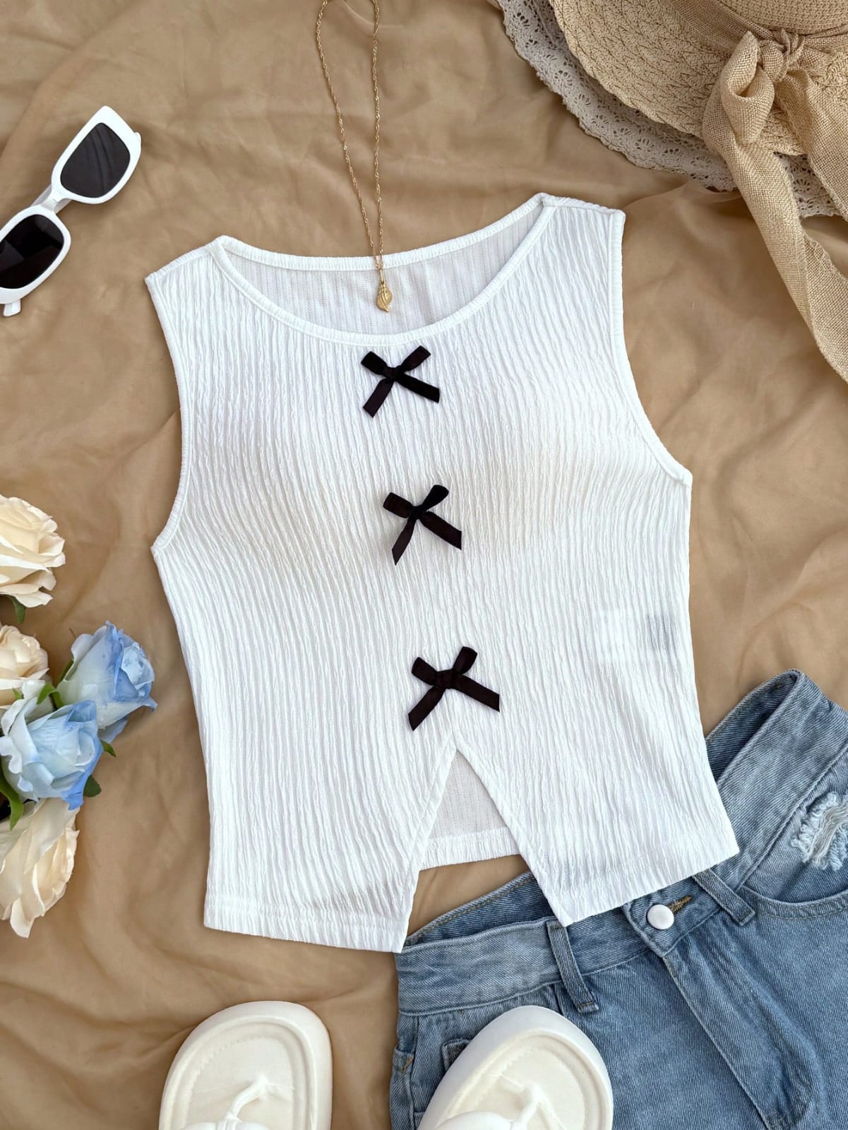 BLUSA DE MUJER CON DECORACION DE LAZOS