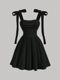 VESTIDO DE MUJER CON TIRANTES DE MALLA