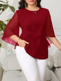 BLUSA DE MUJER Y MANGAS ACAMPANADAS