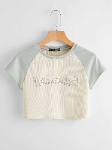 CAMISETA CORTA DE MUJER CON DIBUJOS DE DINOSAURIO