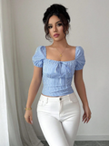CAMISA CELESTE CON RAYAS BLANCAS DE MUJER