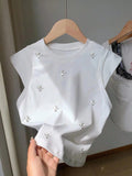 CAMISA CON INCRUSTACIONES DE CRISTAL