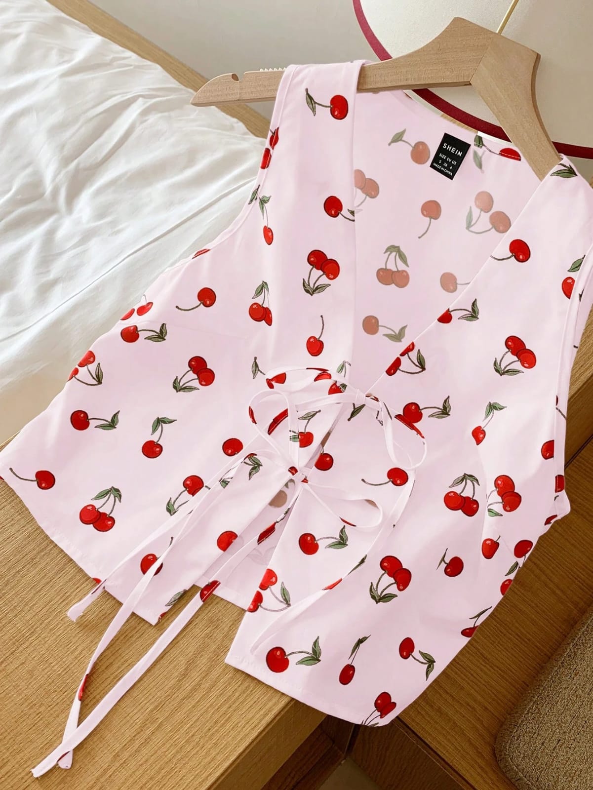 CHALECOS DE CEREZA DE MUJER