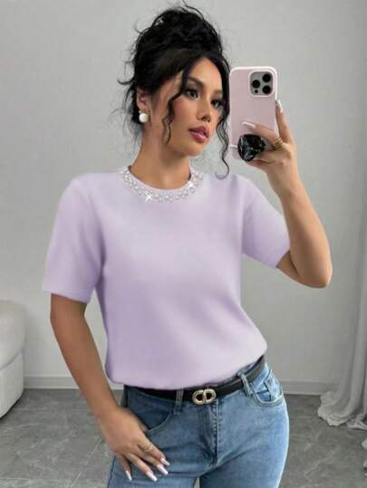 CAMISA CON PERLAS EN EL CUELLO