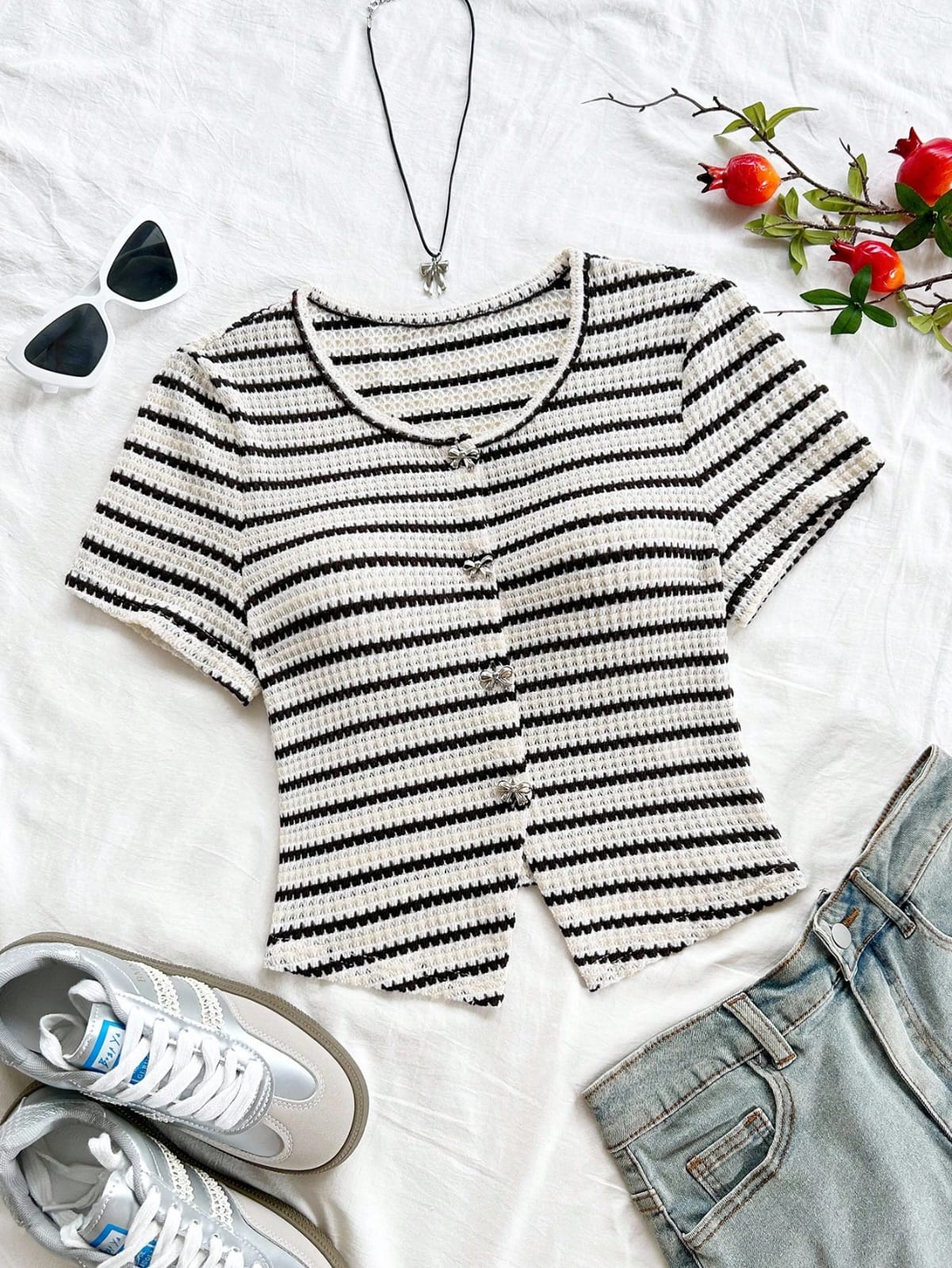 CAMISA CON BOTON DE MOÑO