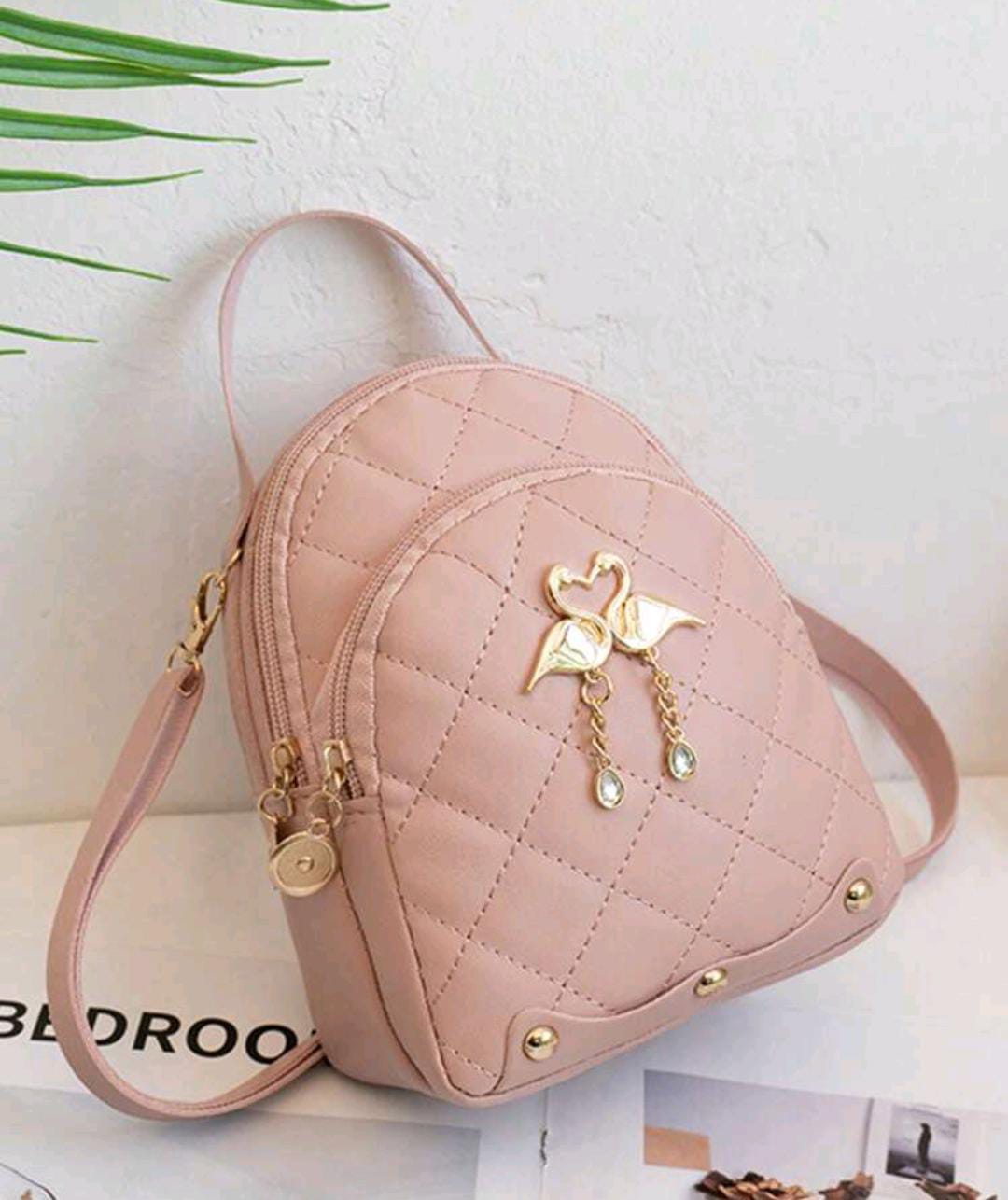 MOCHILA ROSA PEQUEÑA
