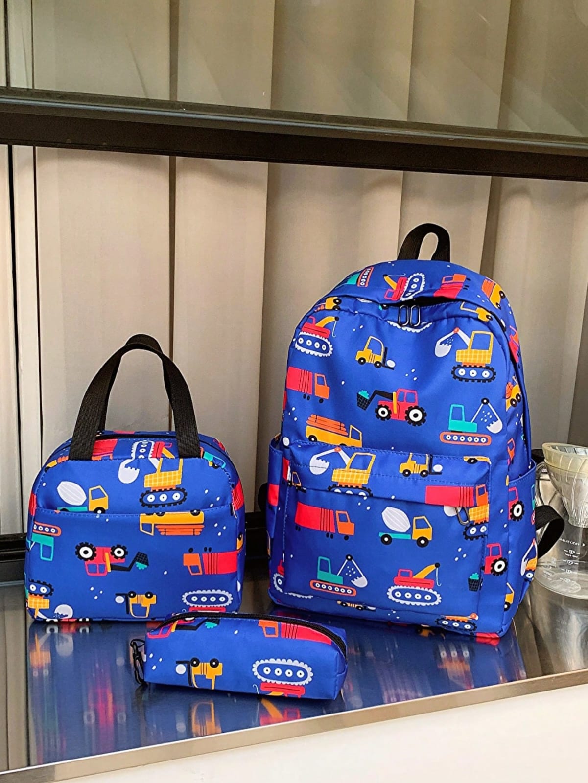 MOCHILA DE NIÑO AZUL DE CARROS
