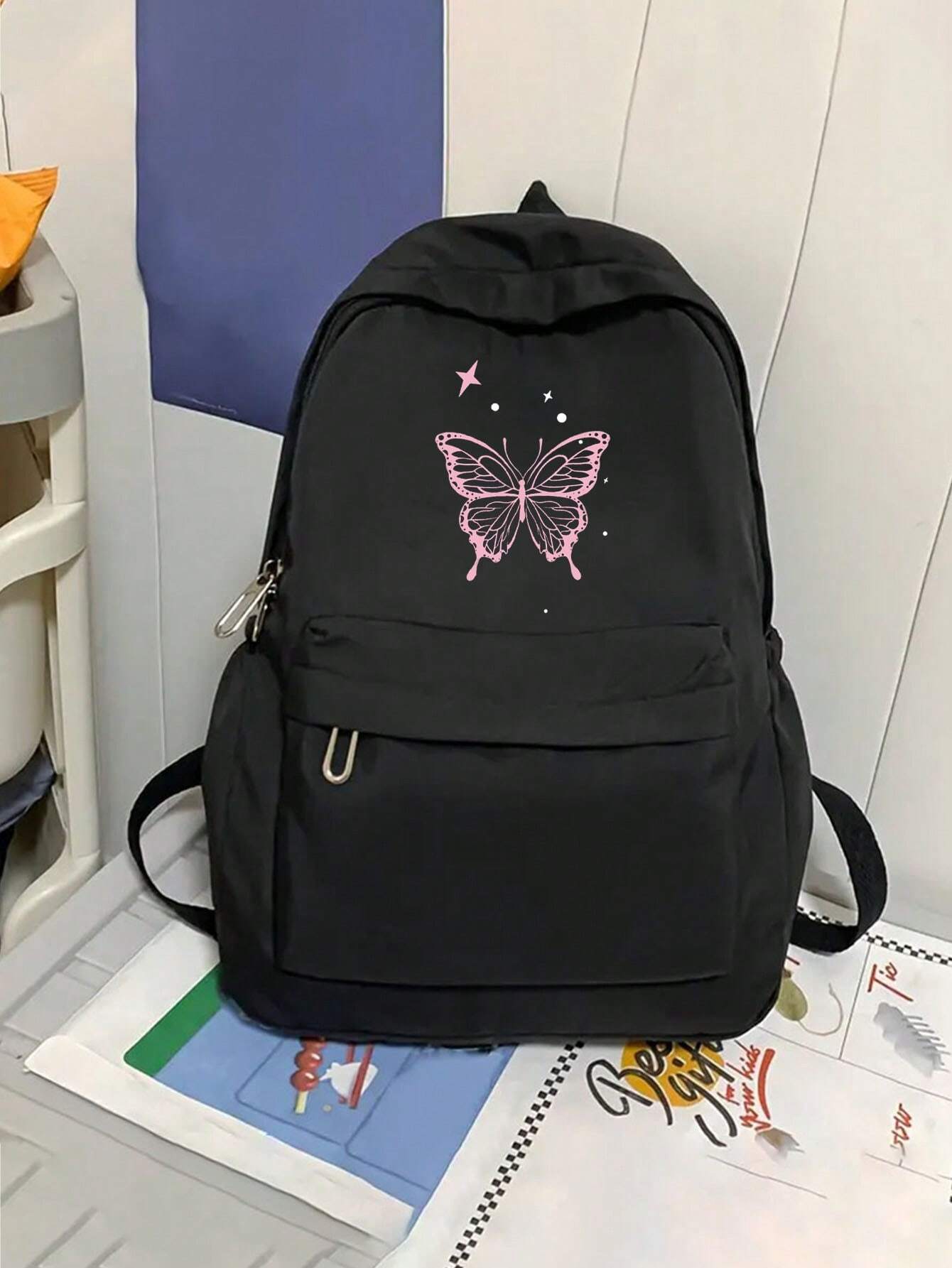 MOCHILA COLOR NEGRO CON DISEÑO DE MARIPOSA