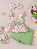 CONJUNTO VERDE CON FLORES ROSADAS Y DIADEMA