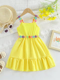 VESTIDO AMARILLO CON FLORES MULTICOLOR DE NIÑA