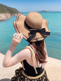 SOMBRERO DE PLAYA CON MOÑO NEGRO