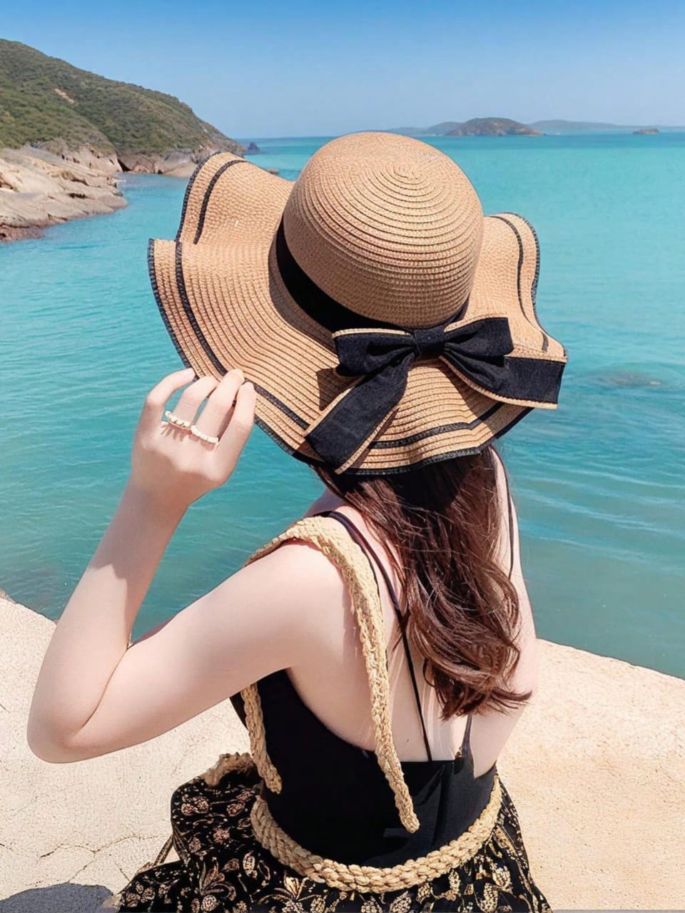 SOMBRERO DE PLAYA CON MOÑO NEGRO