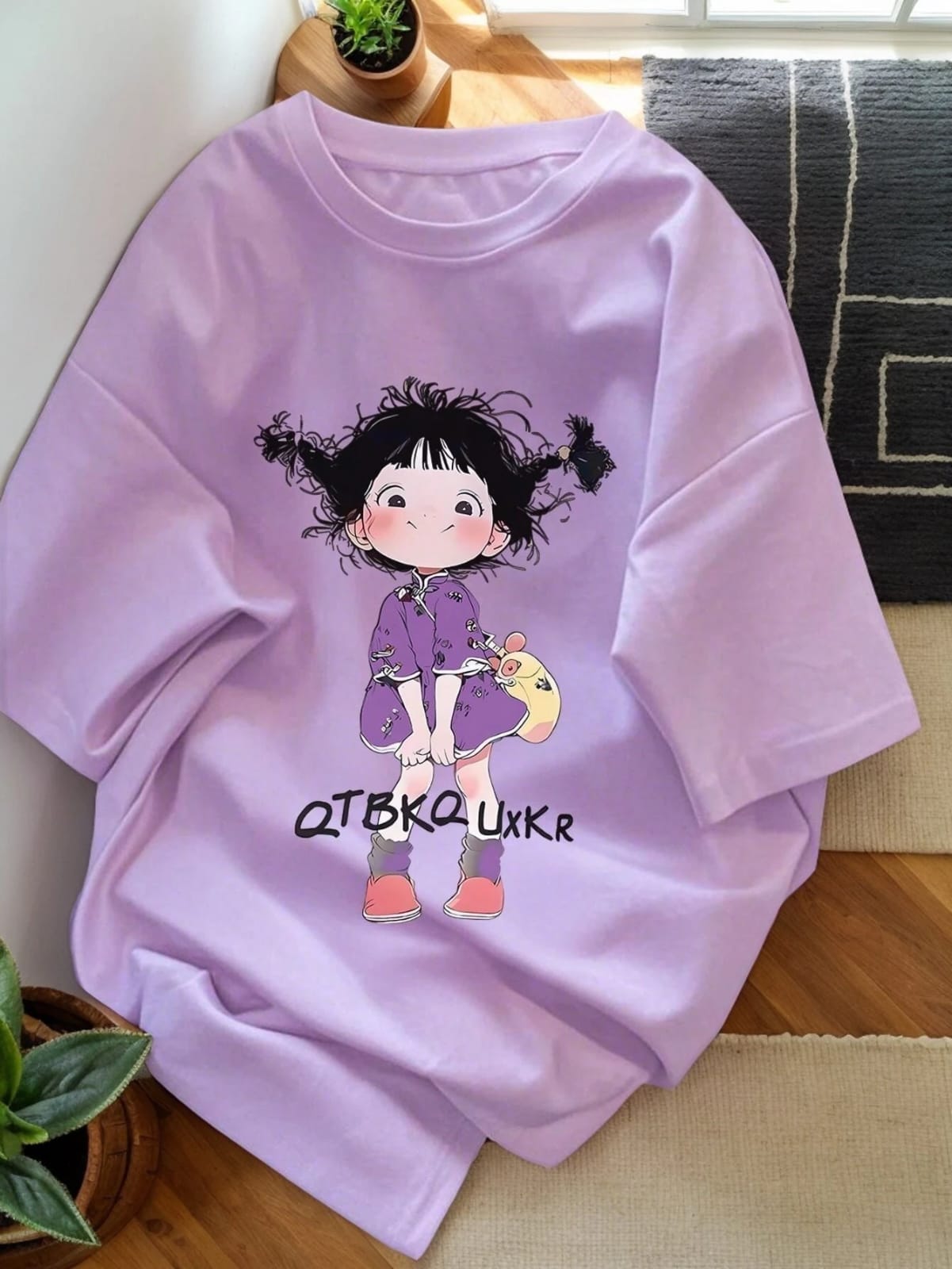 CAMISETA MORADA DE NIÑA