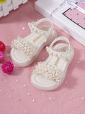 SANDALIAS BLANCAS DE HULE DE NIÑA
