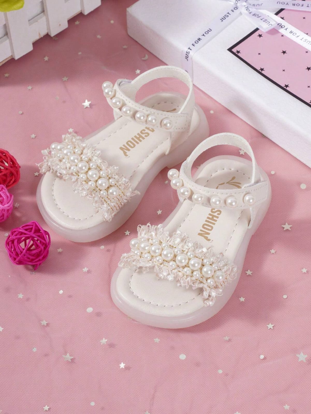 SANDALIAS BLANCAS DE HULE DE NIÑA