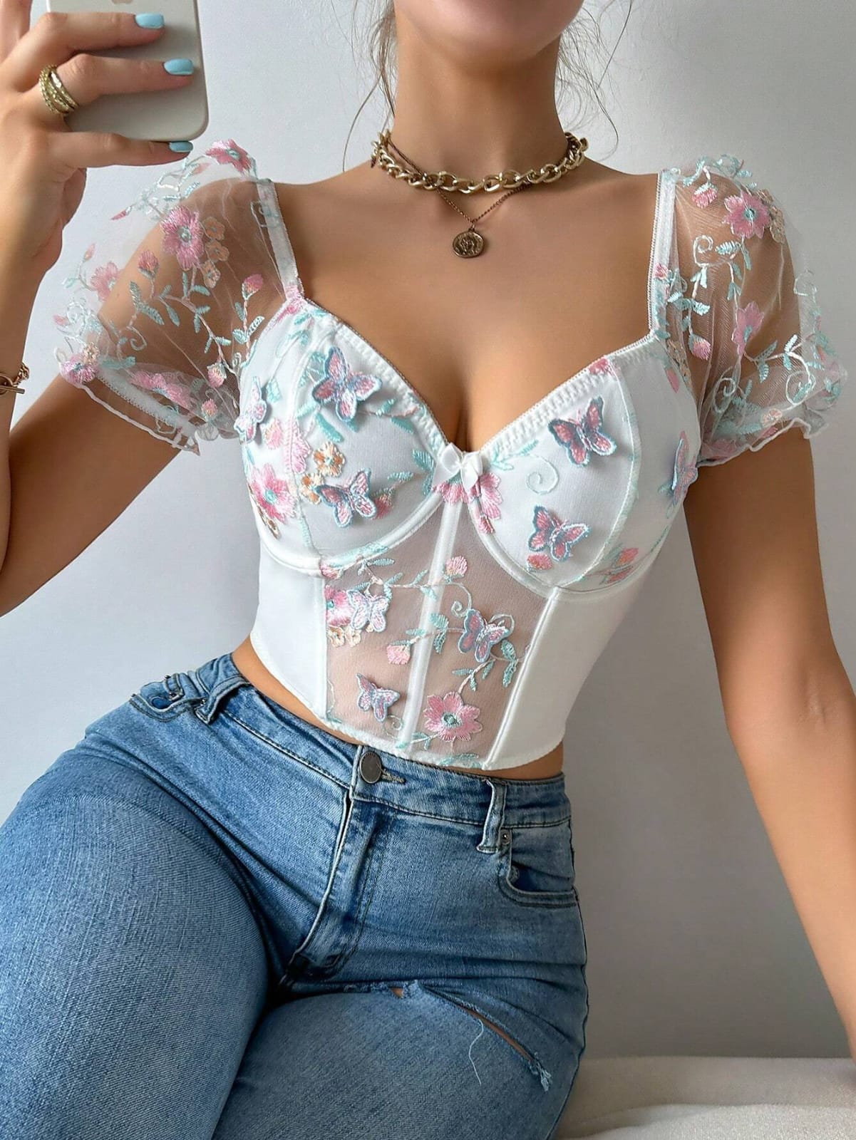 TOP ESTILO CORSET CON FLORES Y MARIPOSA