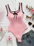 BODY ROSADO CON CINTA NEGRA