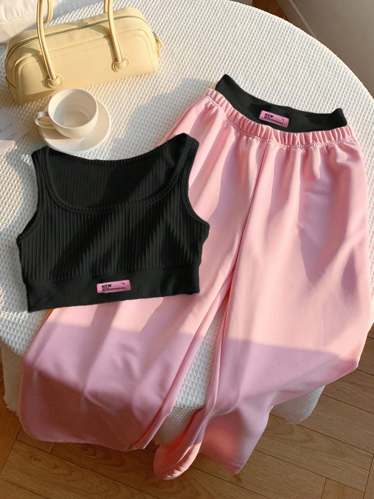 CONJUNTO DE DAMA COLOR ROSADO CON NEGRO