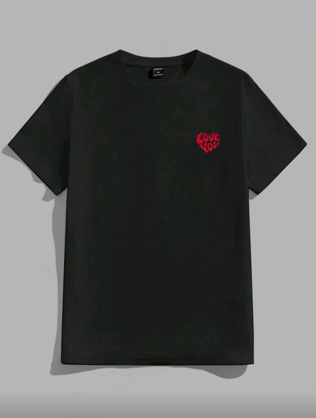 CAMISETA NEGRA CON CORAZÓN