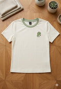 CAMISA BLANCA CON DISEÑO DE DINOSAURIO