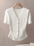 CAMISA DE MUJER DE MANGA CORTA Y BOTONES