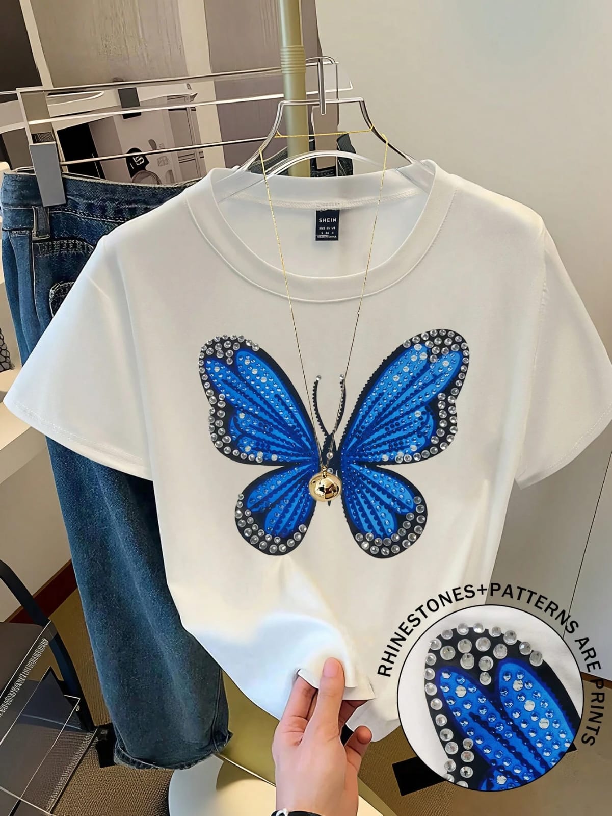 CAMISA DE MUJER CON DISEÑO DE MARIPOSA