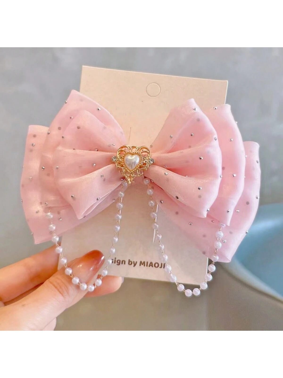 1 UND GANCHO ROSA DE NIÑA