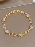 1 PULSERA CON FLOR DE CEREZO