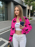 CAMISA DE MUJER CORTA MANGA LARGA CON ESTAMPADO DE LAZOS