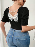 CAMISA DE MUJER CON DECORACION DE LAZO