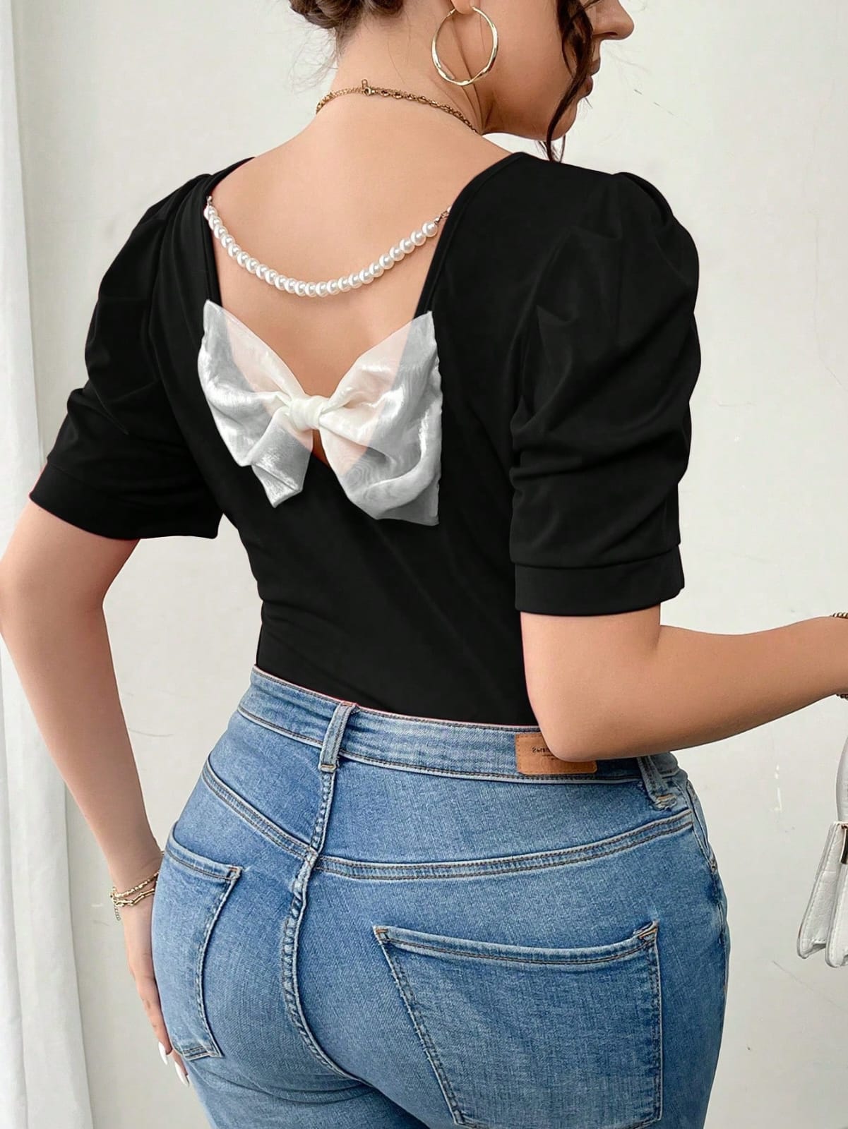 CAMISA DE MUJER CON DECORACION DE LAZO