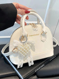 CARTERA CON PERLAS