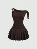 VESTIDO DE MUJER CON DECORACION FLOR DE METAL