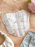 TOP BLANCO CON DISEÑO DE FLORES