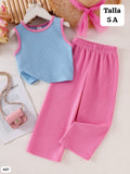 CONJUNTO DE PANTALONETA ROSADA Y TOP DE NIÑA