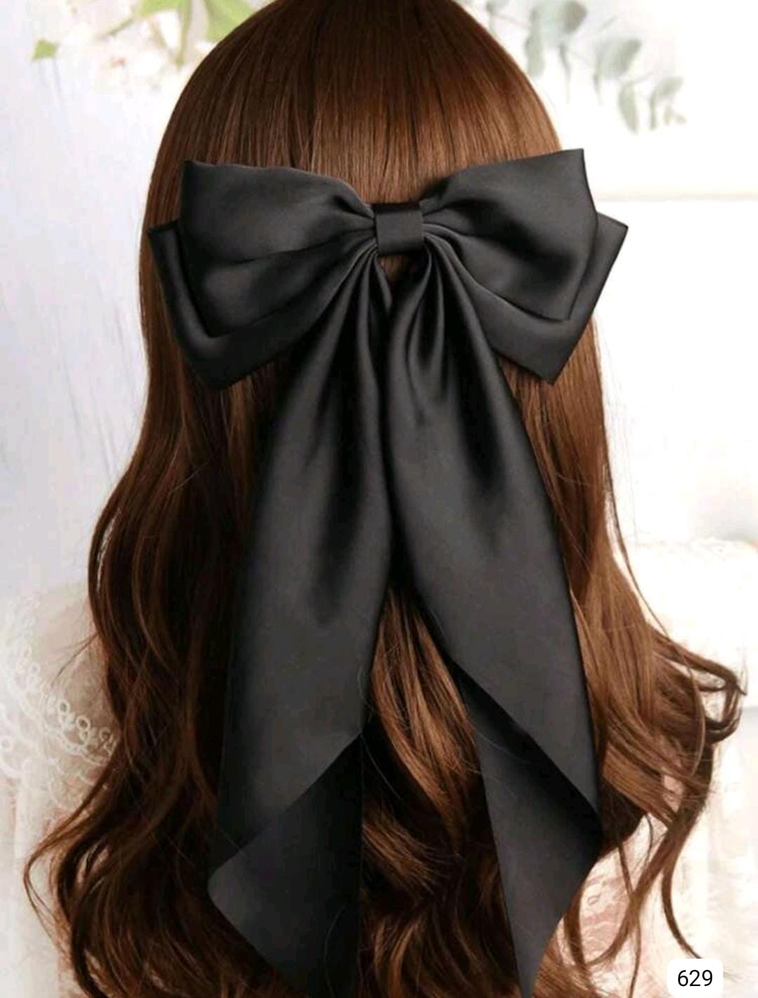 MOÑO NEGRO DE PELO
