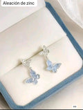 PAR DE ARETES CELESTES DE MARIPOSAS