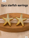 PAR DE ARETES DE ESTRELLA DE MAR DORADO