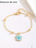 PULSERA DORADA DE FLOR CELESTE