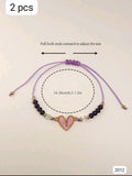 2 PULSERAS MORADAS DE AMISTAD