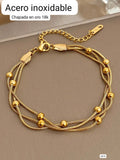 PULSERA DORADA DE ACERO