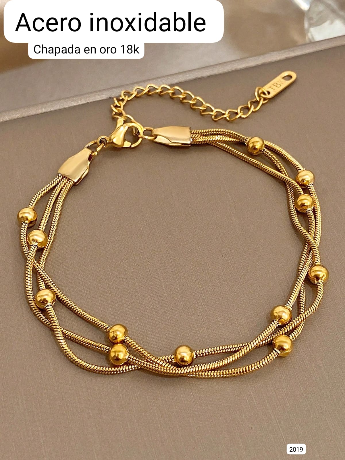 PULSERA DORADA DE ACERO