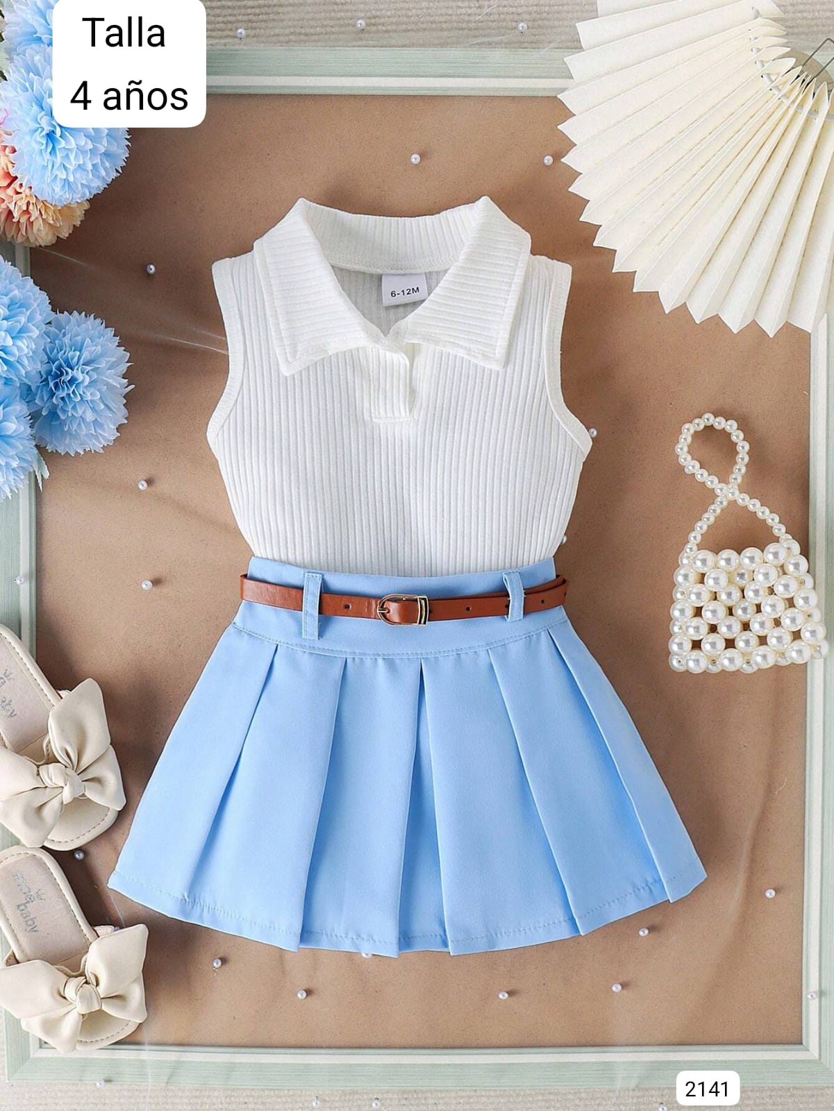 CONJUNTO DE FALDA CELESTE DE NIÑA