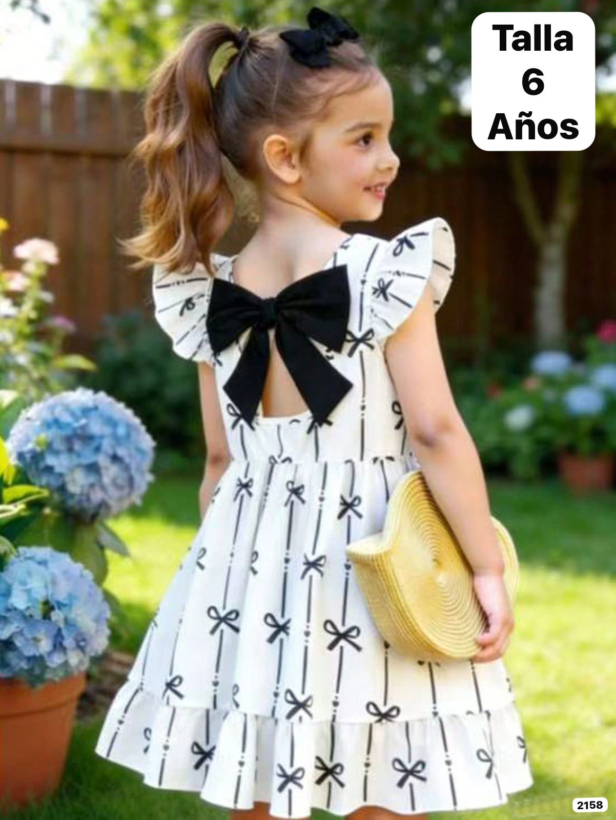 VESTIDO BLANCO CON ESTAMPADO DE CHONGOS NEGROS DE NIÑA