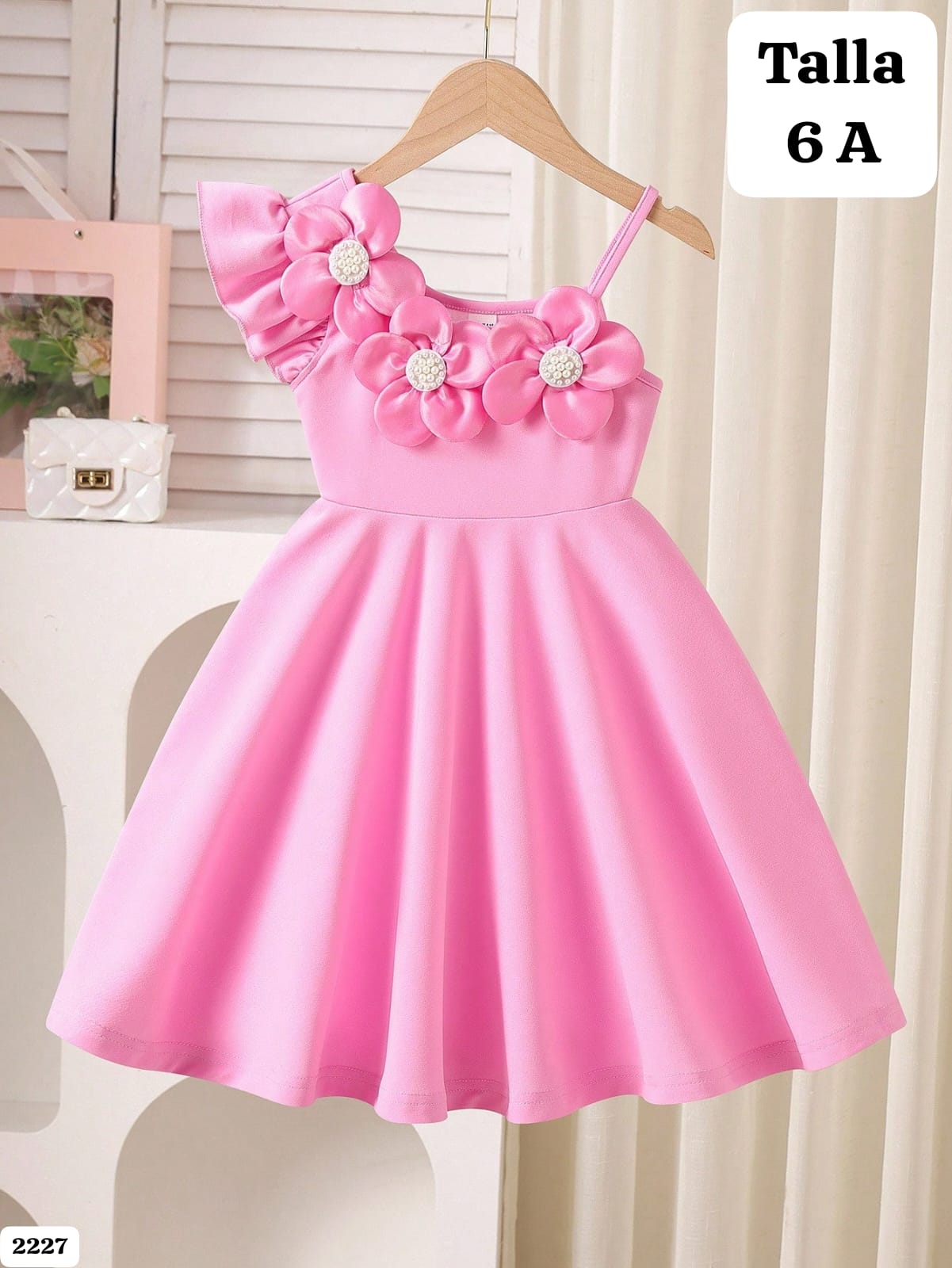 VESTIDO ROSA CON FLORES DE NIÑA