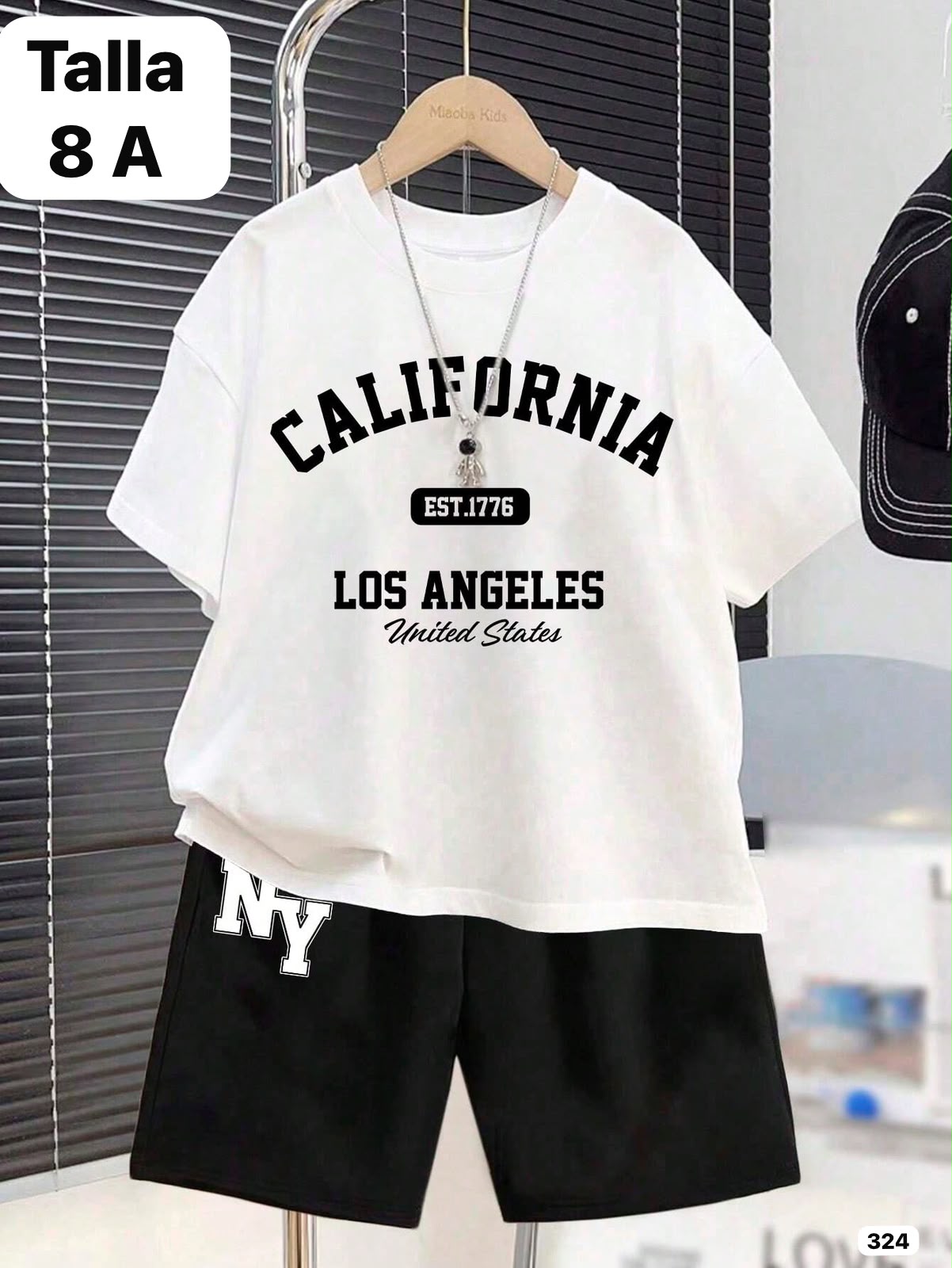 CONJUNTO DE CAMISA BLANCA Y SHORT NEGRO DE NIÑO