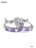 PAR DE ARETES PLATEADOS CON MORADO DE MUJER
