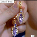ARETES DORADOS CON MORADO