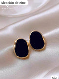 ARETES NEGROS CON BORDE DORADO