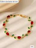 PULSERA DORADA CON FLORES ROJAS